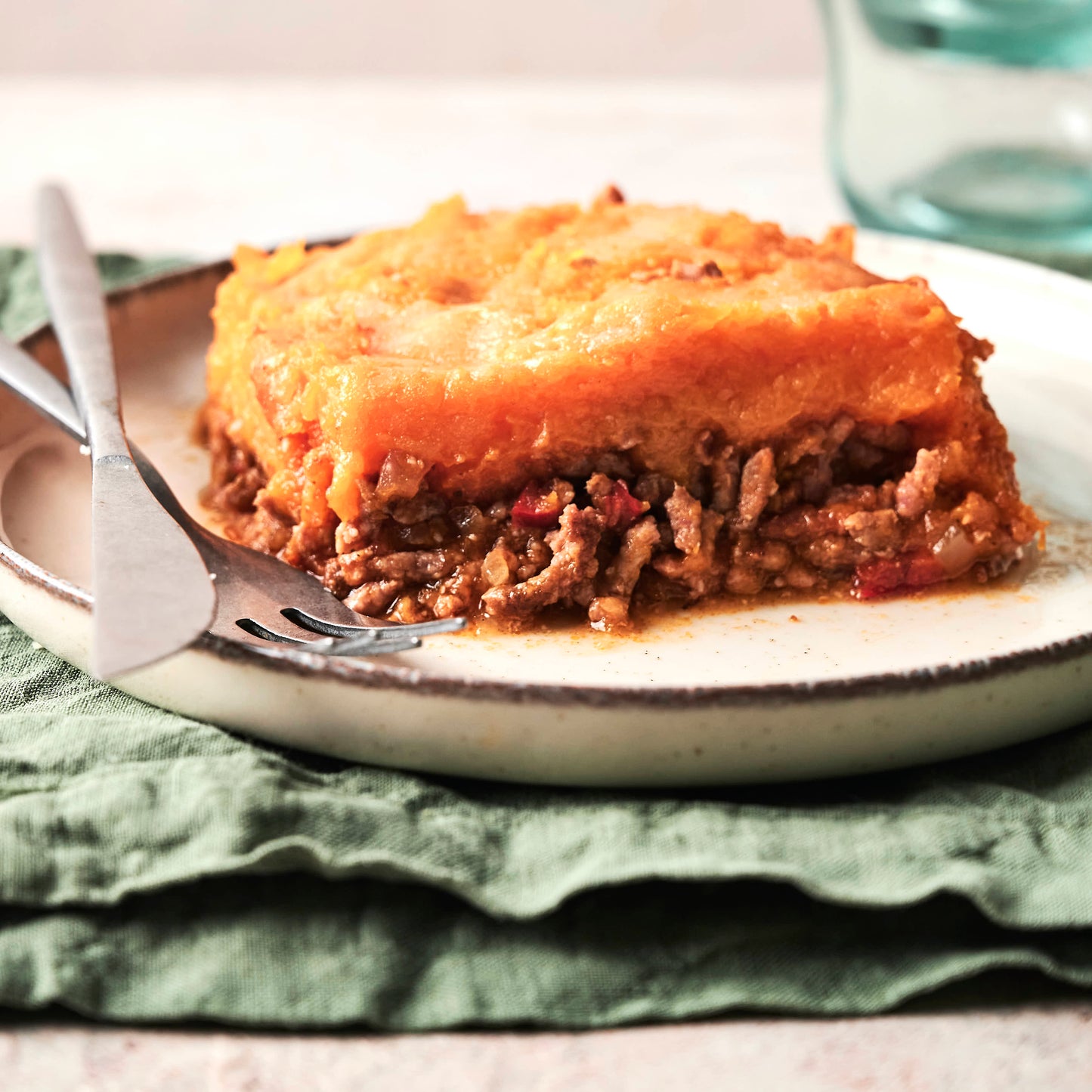 Pastel gratinado de calabaza, boniato y carne