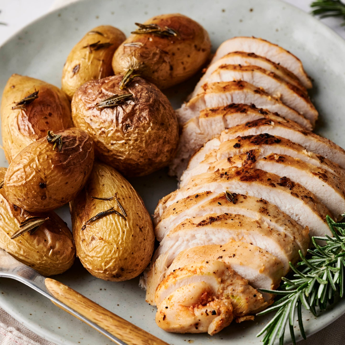 Pollo con patatines al horno