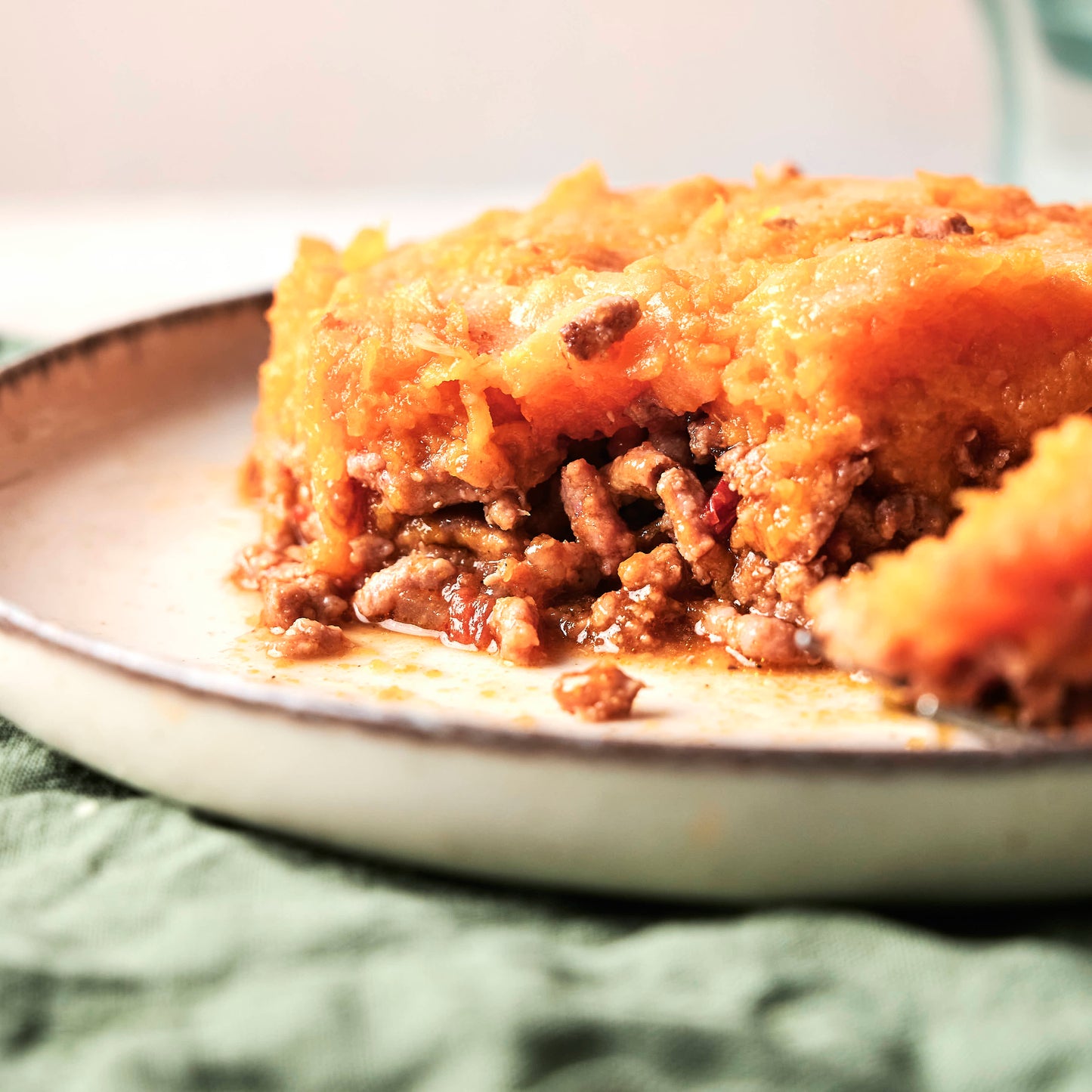 Pastel gratinado de calabaza, boniato y carne